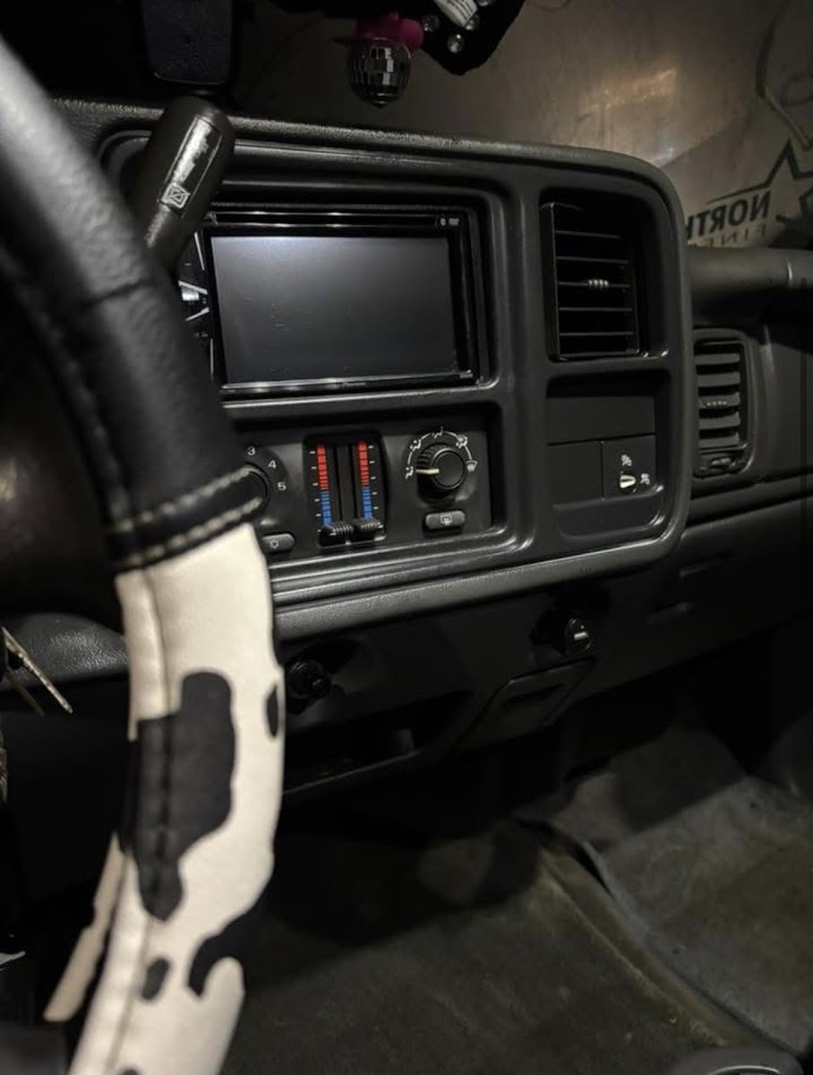 Cleaned interior of a Chevrolet Silverado pickup showing the dash, vents and stereo